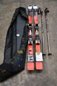 A pair of pre-owned Volki Race Tiger Ski's, RC165, complete with poles and carry bag.