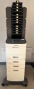 A pre-owned Lexmark M5170 A4 Mono Laser Printer with four extra paper feed trays and three 4-bin