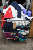 A basket of pre-owned sports jackets to include Reebox, Nike, Patagonia Belstaff, Ellesse, Adidas, K
