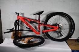 An as new boxed Canyon Neuron 5 Bike in red