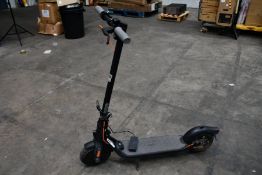 A pre-owned Segway Ninebot Kickscooter Electric Scooter with charger