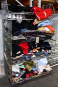 A large quantity of assorted pre - owned clothing and related items (Basket not included)