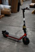 A pre-owned Sedway Ninebot D18E Electric Folding Scooter, black and red