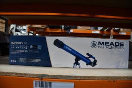 A boxed as new Meade Infinity 50 reflector telescope
