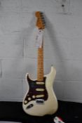A Fender Player Plus Stratocaster, left-handed, maple fingerboard, Olympic Pearl