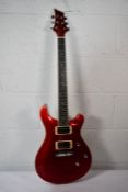 An as new Harley Bernton CST-24 electric guitar in cherry flame