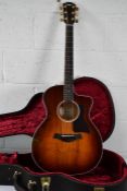 A pre-owned Taylor 200 Series acoustic guitar (Model 224CE-UA DLX) with hard case