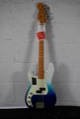 An as new Fender left handed Player Plus Precision Bass Ion Belair Blue with carry case
