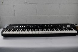 A pre-owned KORG -2 88 RH3 keyboard with hammer mechanism, no screen