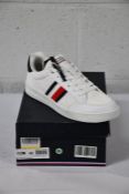 A pair of boxed Tommy Hilfiger retro cupsole knit mix stripes (Size 42)