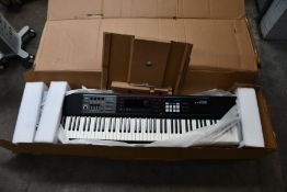 A pre-owned Roland JUNO-DS 88 Synthesizer Keyboard, untested