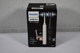 A Philips Sonicare DiamondClean 9000 Electric Toothbrush Duo Pack HX9914/57