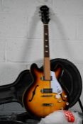 An as new Epiphone Casino semi-hollow guitar in vintage sunburst with hard case