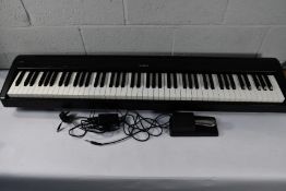 A pre-owned Kawai ES110 Digital Piano with bag plus stand
