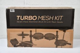 An Alesis Turbo Mesh Kit, Seven-Piece Electronic Drum Kit with Mesh Heads