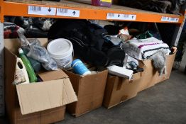 Nine boxes of miscellaneous items to include Power Sonic Battery, a Dakine, Vital Proteins Collagen