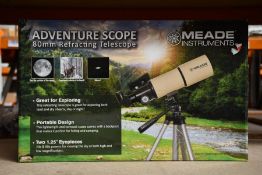A boxed as new Meade Adventure Scope refracting telescope
