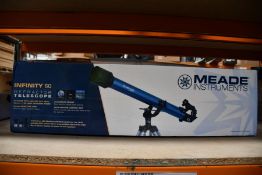 A boxed as new Meade Infinity 60 reflector telescope