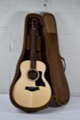 A Taylor acoustic guitar