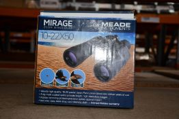 A boxed as new Meade Mirage 10 - 22 x 50 binoculars