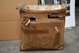 A Thule EasyFold XT 3 Towbar Mounted Bike Rack, box damaged