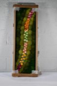 A piece of Creative Moss lighted artwork, 120 x 40 cm