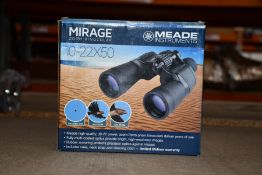 A boxed as new Meade Mirage 10 - 22 x 50 binoculars
