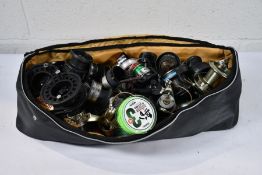 A bag of fishing reels and lines, viewing advised