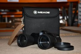 An as new Meade travel view 10 x 50 binoculars (Unboxed)