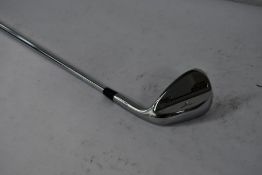 A Mizuno T22 C-Grind raw wedge right handed
