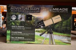 A boxed as new Meade Adventure Scope refracting telescope