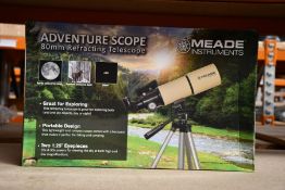A boxed as new Meade Adventure Scope refracting telescope