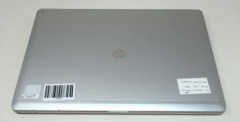 NO HARD DRIVE INSTALLED: A pre-owned HP EliteBook Folio 9470m 14