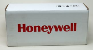 A boxed as new Honeywell CT50-EB-2-R eHomeBase Charging Cradle (Box opened).