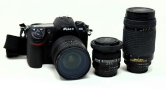A pre-owned Nikon D300 Digital SLR Camera (2 x batteries & charger included) with a Nikon Nikkor AF