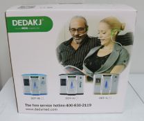 An as new Dedakj DDT-1A Oxygen Concentrator (Box opened, some damage to box).