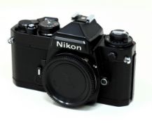 A pre-owned Nikon FE SLR 35mm Film Camera (Body Only) (Cosmetic grade B. Untested, sold as seen).
