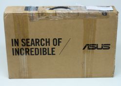 A pre-owned ASUS E410M 14