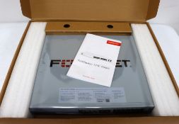 A boxed as new Fortinet FortiSwitch 124E-FPOE Secure Access Switch (P/N: P21391-01-01 EU) (Box opene