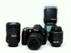 A pre-owned Nikon D90 Digital SLR Camera Body (1 x battery included) with a Sigma 18-200mm f/3.5-6.3