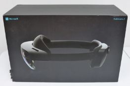 A pre-owned Microsoft HoloLens 2 Smart Glasses Device (P/N: NJX-00002 M/N: 1855 EAN: 889842476866) (
