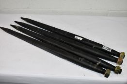 Four pre-owned Granit front loader tines.