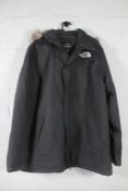 A pre-owned men's North Face Zaneck Hooded Jacket in black (L).