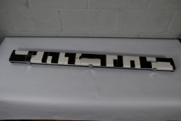 An as new Peradon 3/4 Halo Plus black and white patches cue case