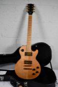 A pre-owned Gibson Les Paul Studio Raw Power, Natural Satin 2009 (LPSRPNSGHI, excellent condition).