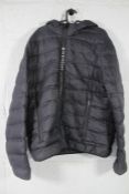 A pre-owned Givenchy Logo-Tape Hooded Padded Jacket in black (52).