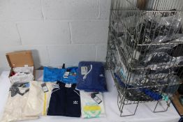 A large quantity of assorted as new Adidas clothing to include a Lego Play Windbreaker, a Waffle Pol