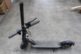 A pre-owned Mi Electric Scooter (Damaged - suitable for parts/spares).