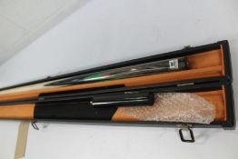 An as new O'min Shiny Lake Snooker Cue with case.
