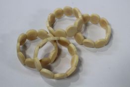 A large quantity of Tagua (vegetable ivory) elasticated bracelets (approximately 200).